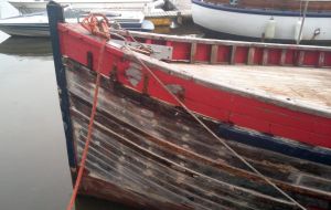 Wooden hull plank seams caulking payed (sealed) with traditional putty