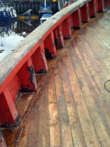 Wooden deck repair caulking and cover boards