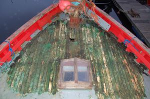 stripping the deck of an old scottish mfv houseboat conversion